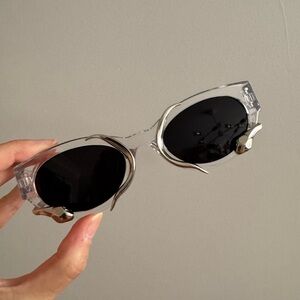 Clear Frame Edgy Y2K Rave Sunglasses with Black Lenses and Metallic Snake Detail